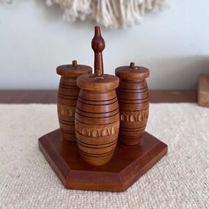 Set of Three Hand-Carved Wooden Shakers on Matching Base (4039)